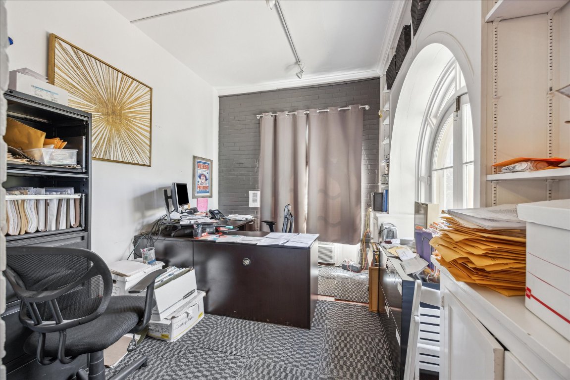 2404 Rio Grande Street Austin, TX 78705 - Photo 12 of 28 a living room with furniture and a window