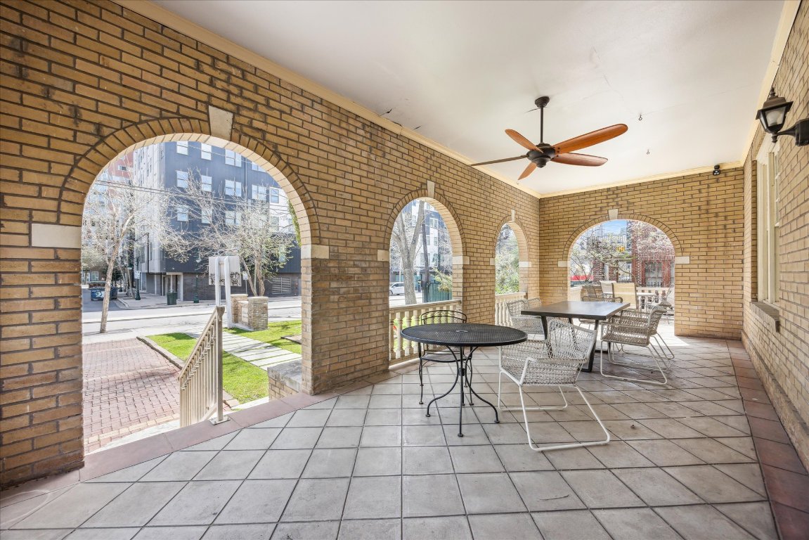 2404 Rio Grande Street Austin, TX 78705 - Photo 21 of 28 a view of living room filled with furniture and a clock