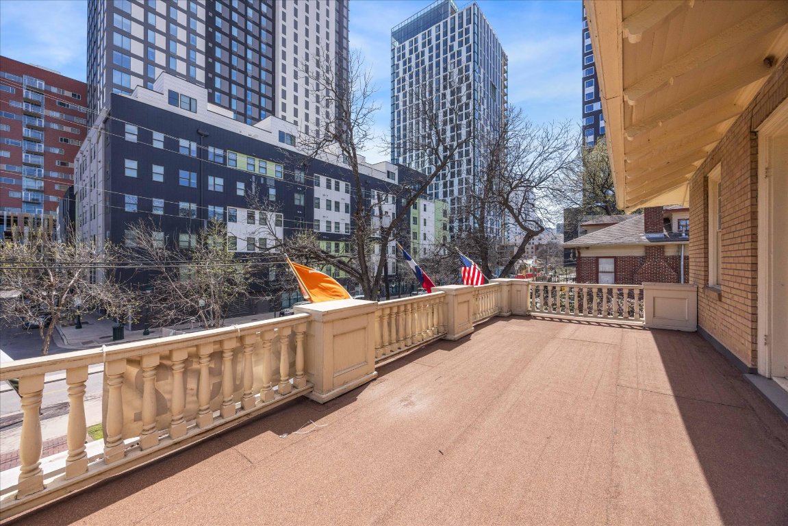 2404 Rio Grande Street Austin, TX 78705 - Photo 23 of 28 a view of balcony with wooden floor