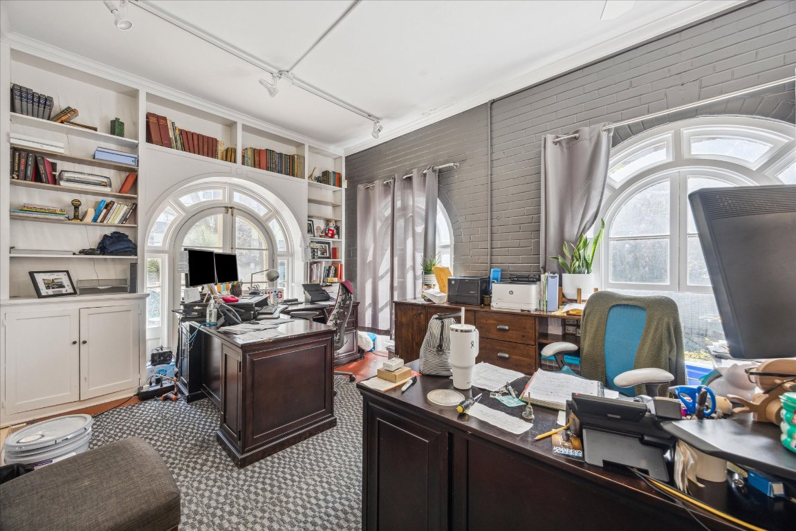 2404 Rio Grande Street Austin, TX 78705 - Photo 5 of 28 a living room with fireplace furniture and a flat screen tv
