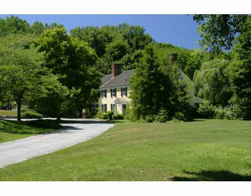 Undisclosed Address Greenwich, CT 06831 - Photo 3 of 6 a view of a house with a yard