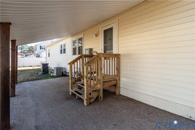 a view of backyard with deck and deck