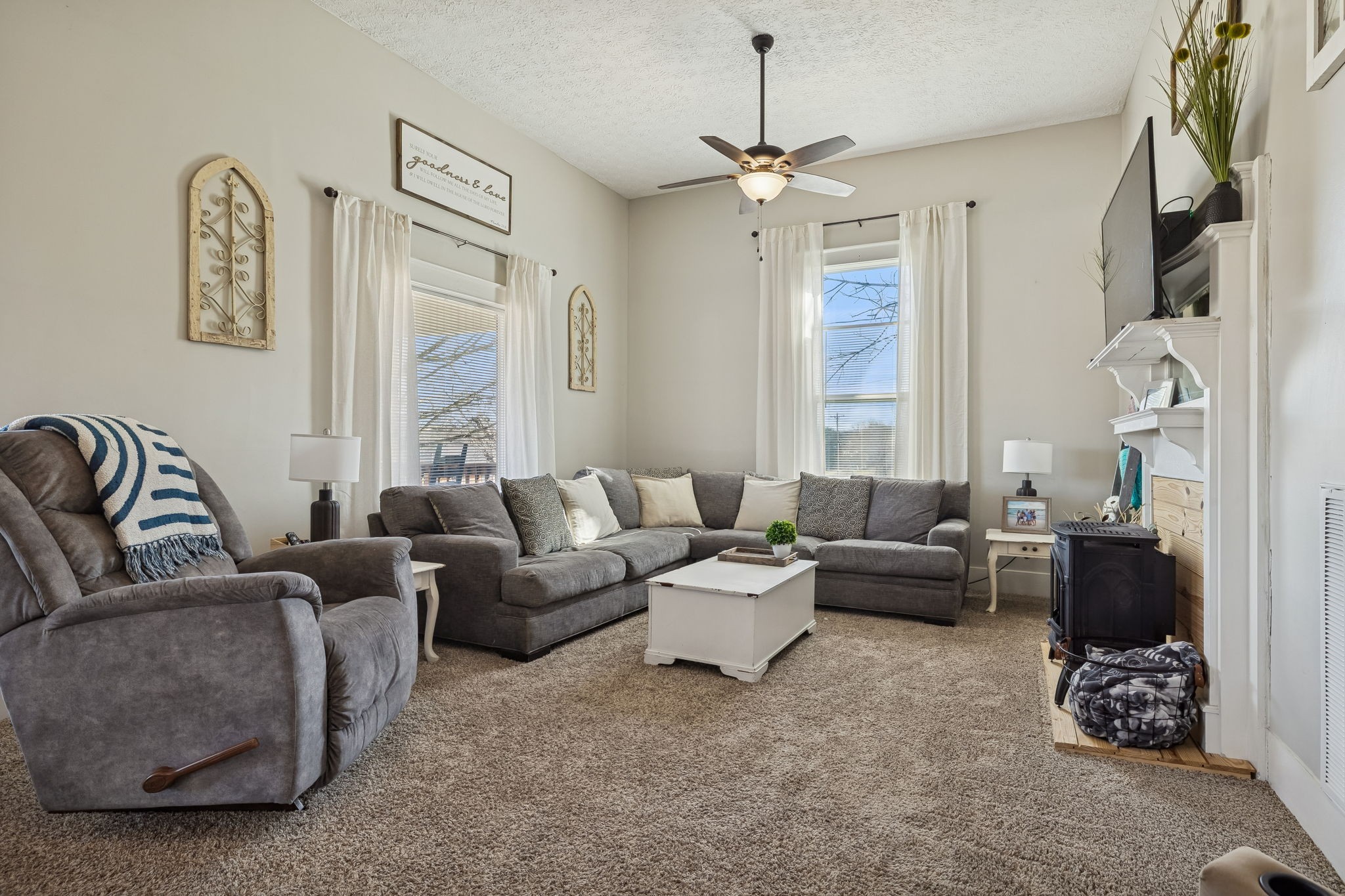 15 Switchboard Road Brush Creek, TN 38547 - Photo 13 of 60 a living room with furniture and a chandelier