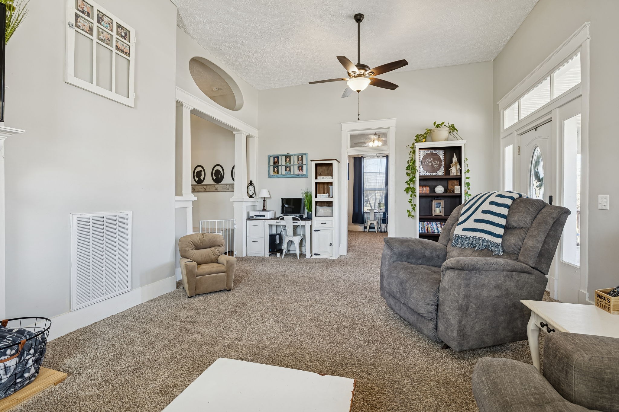 15 Switchboard Road Brush Creek, TN 38547 - Photo 14 of 60 a living room with furniture and a chandelier