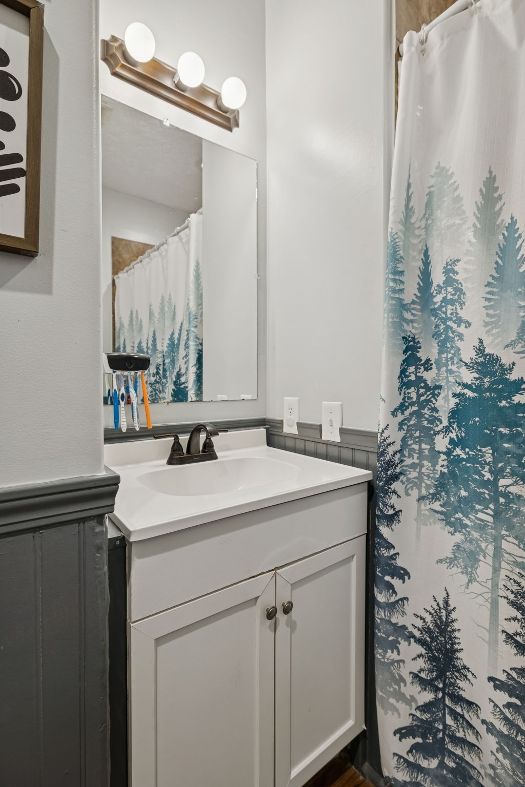 15 Switchboard Road Brush Creek, TN 38547 - Photo 34 of 60 a bathroom with a sink and a mirror