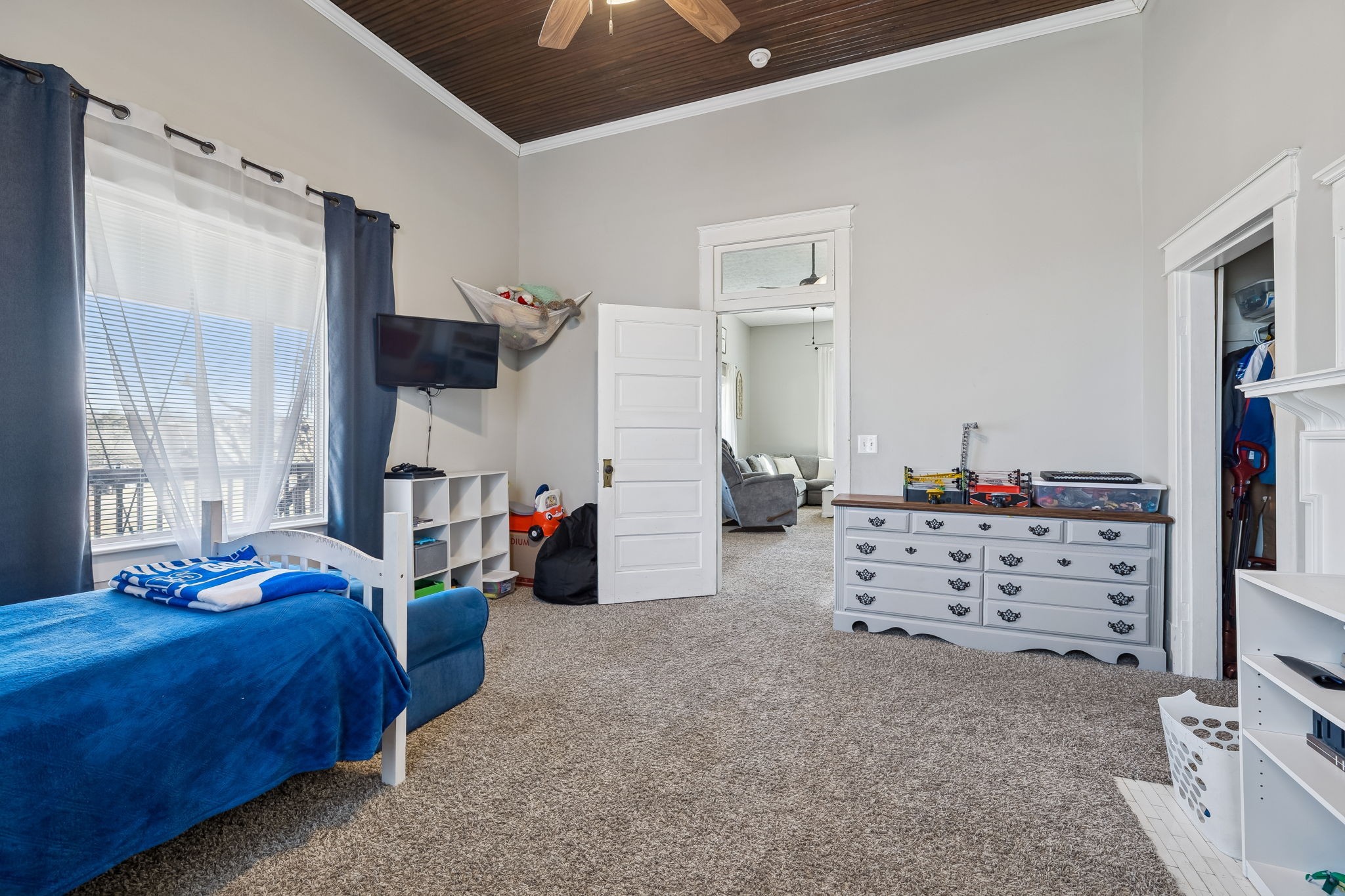 15 Switchboard Road Brush Creek, TN 38547 - Photo 36 of 60 a bed room with a bed dresser and a window