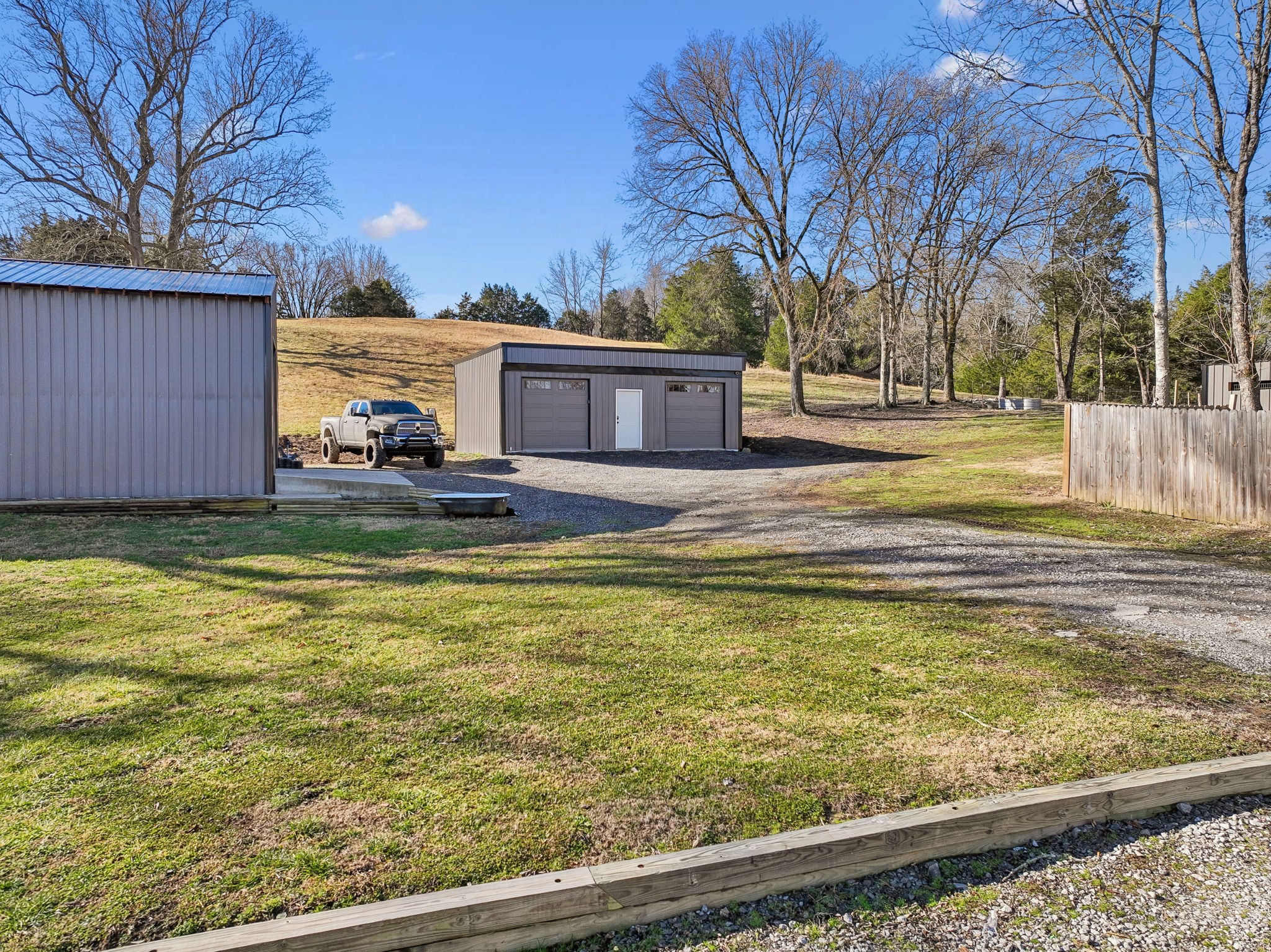 15 Switchboard Road Brush Creek, TN 38547 - Photo 46 of 60 a view of a house with pool and snow on the road