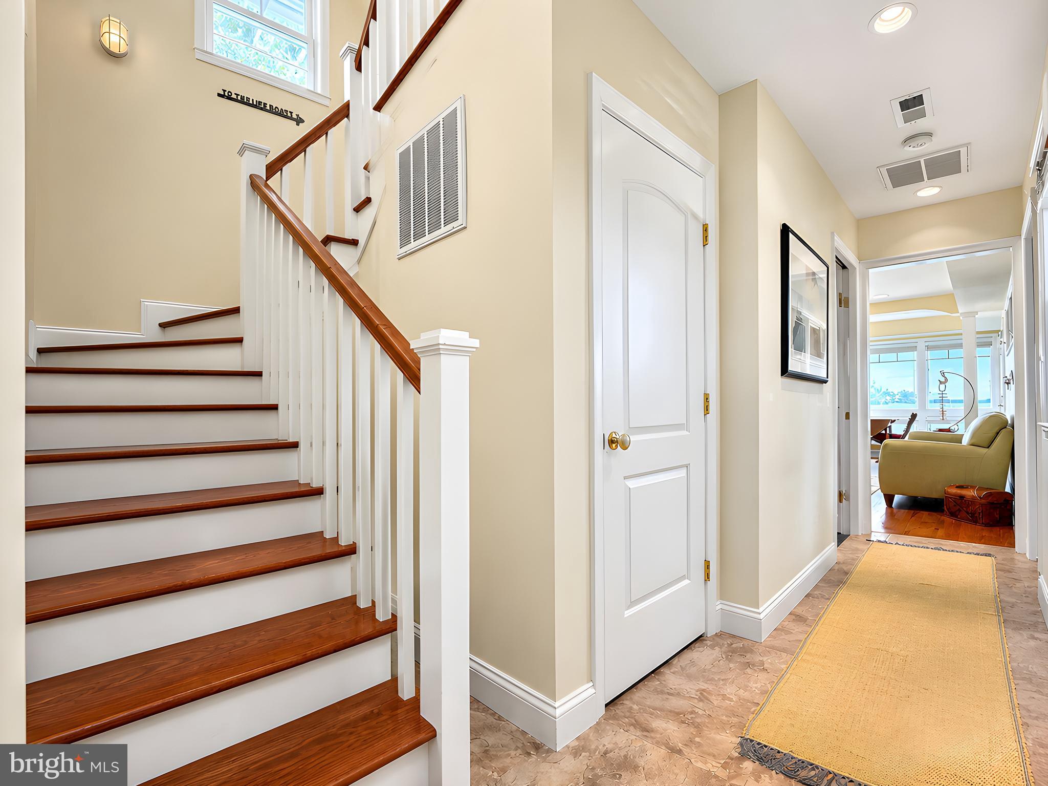 16144 Thomas Road Piney Point, MD 20674 - Photo 42 of 98 Stunning Custom Staircase leading to 2nd Level