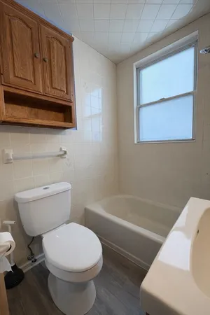 a bathroom with a sink and a bathtub