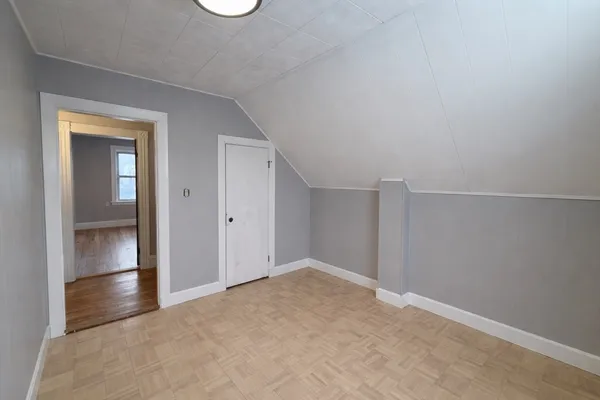 a bathroom with a toilet a sink and bathtub
