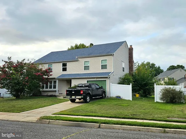 a car parked in front of a house
