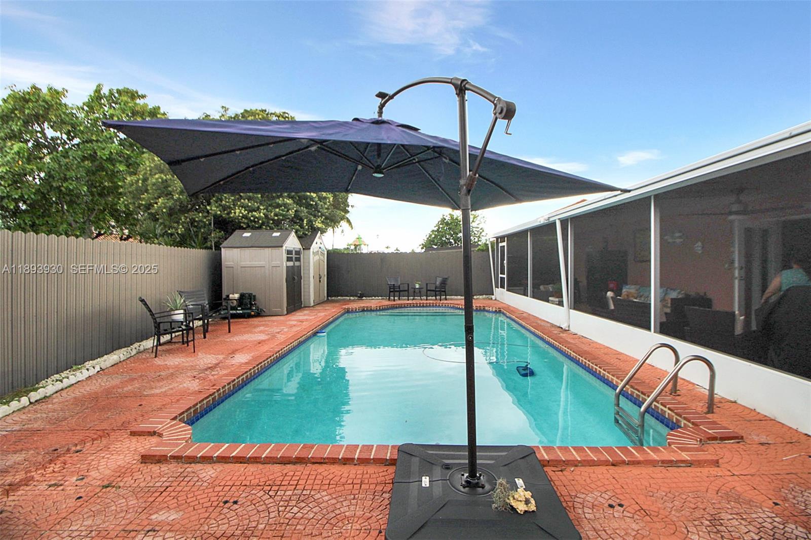 13246 Southwest 9th Terrace Miami, FL 33184 - Photo 18 of 34 a small pool with an outdoor seating