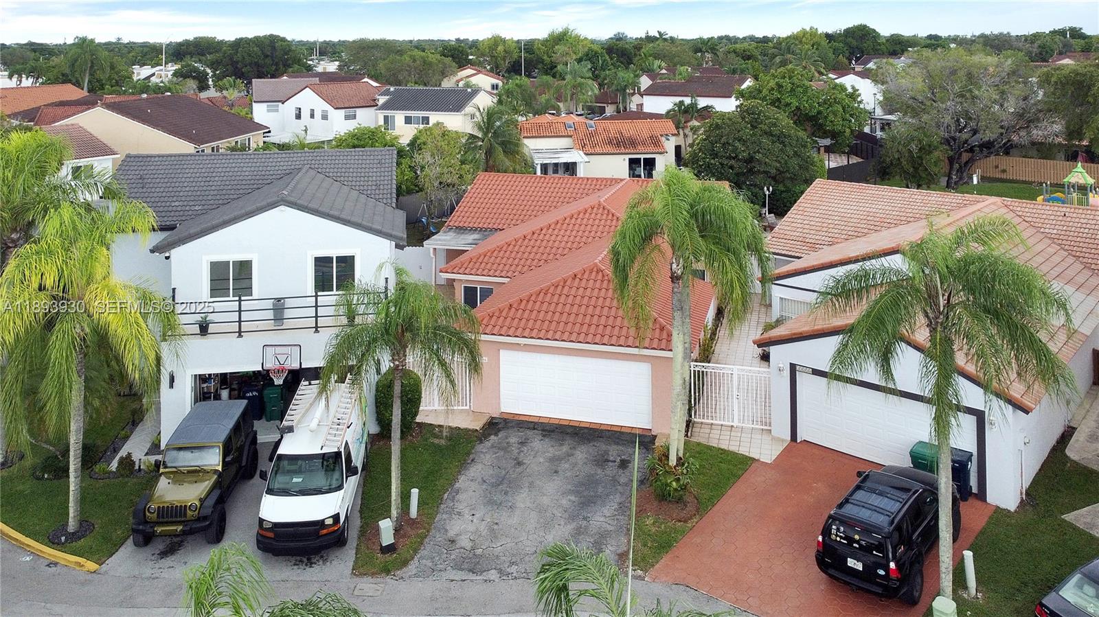 13246 Southwest 9th Terrace Miami, FL 33184 - Photo 29 of 34 a view of multiple houses with a yard