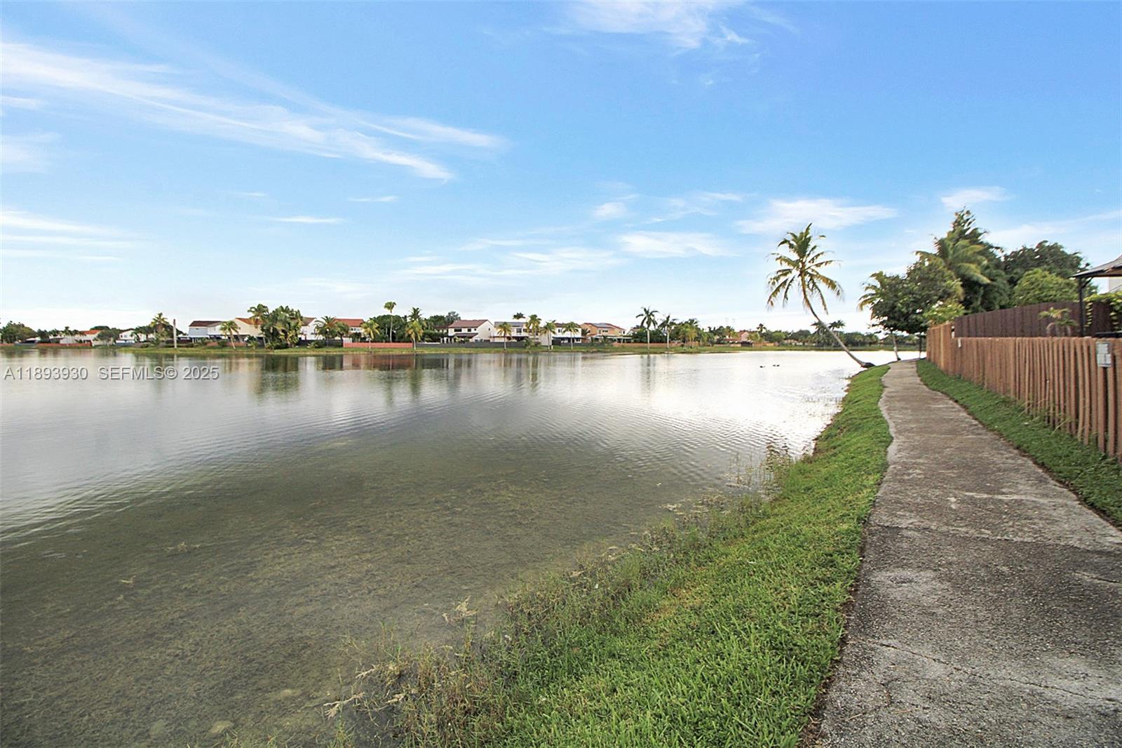 13246 Southwest 9th Terrace Miami, FL 33184 - Photo 32 of 34 a view of a lake with houses