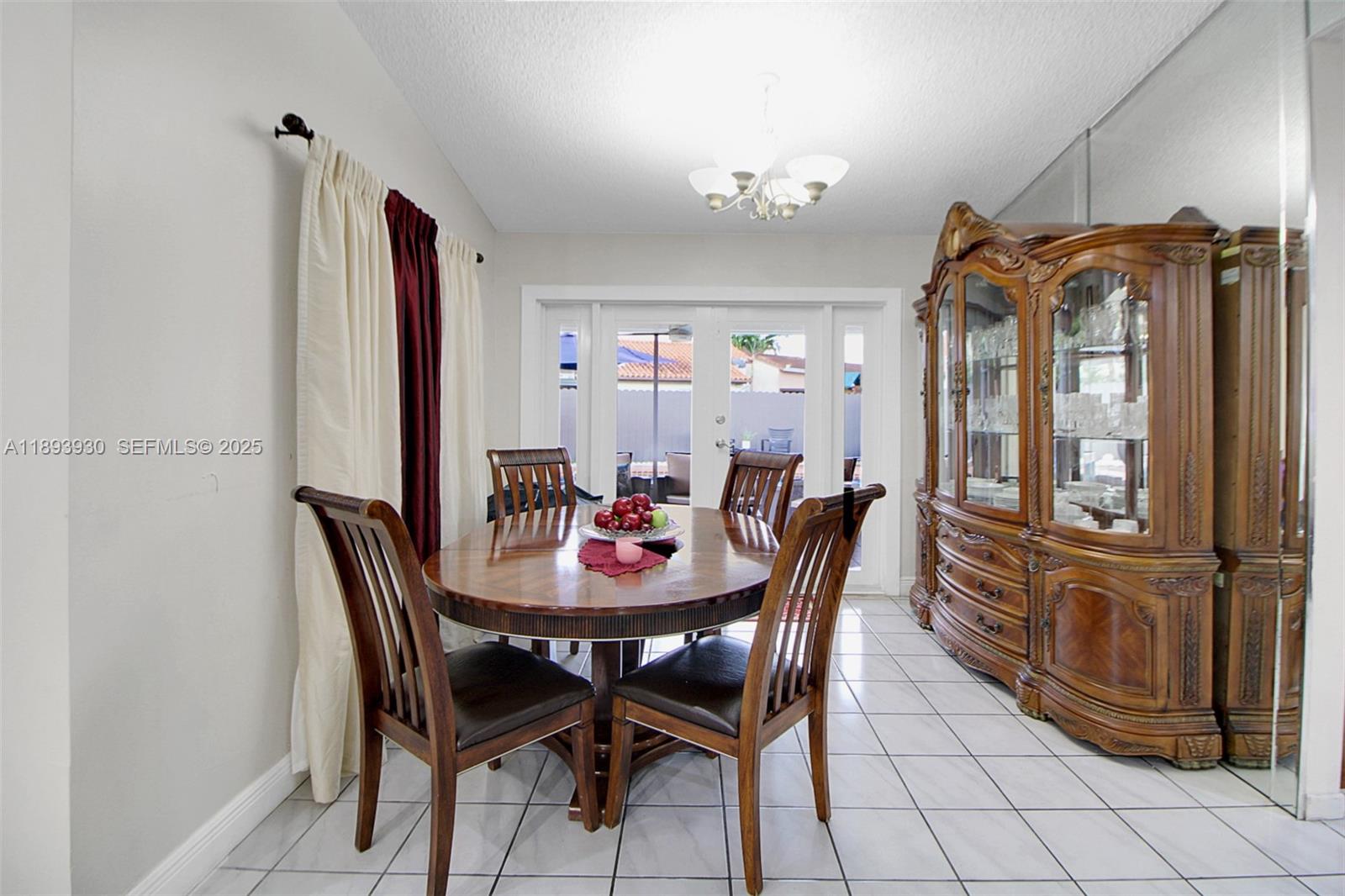 13246 Southwest 9th Terrace Miami, FL 33184 - Photo 8 of 34 a view of a dining room with furniture