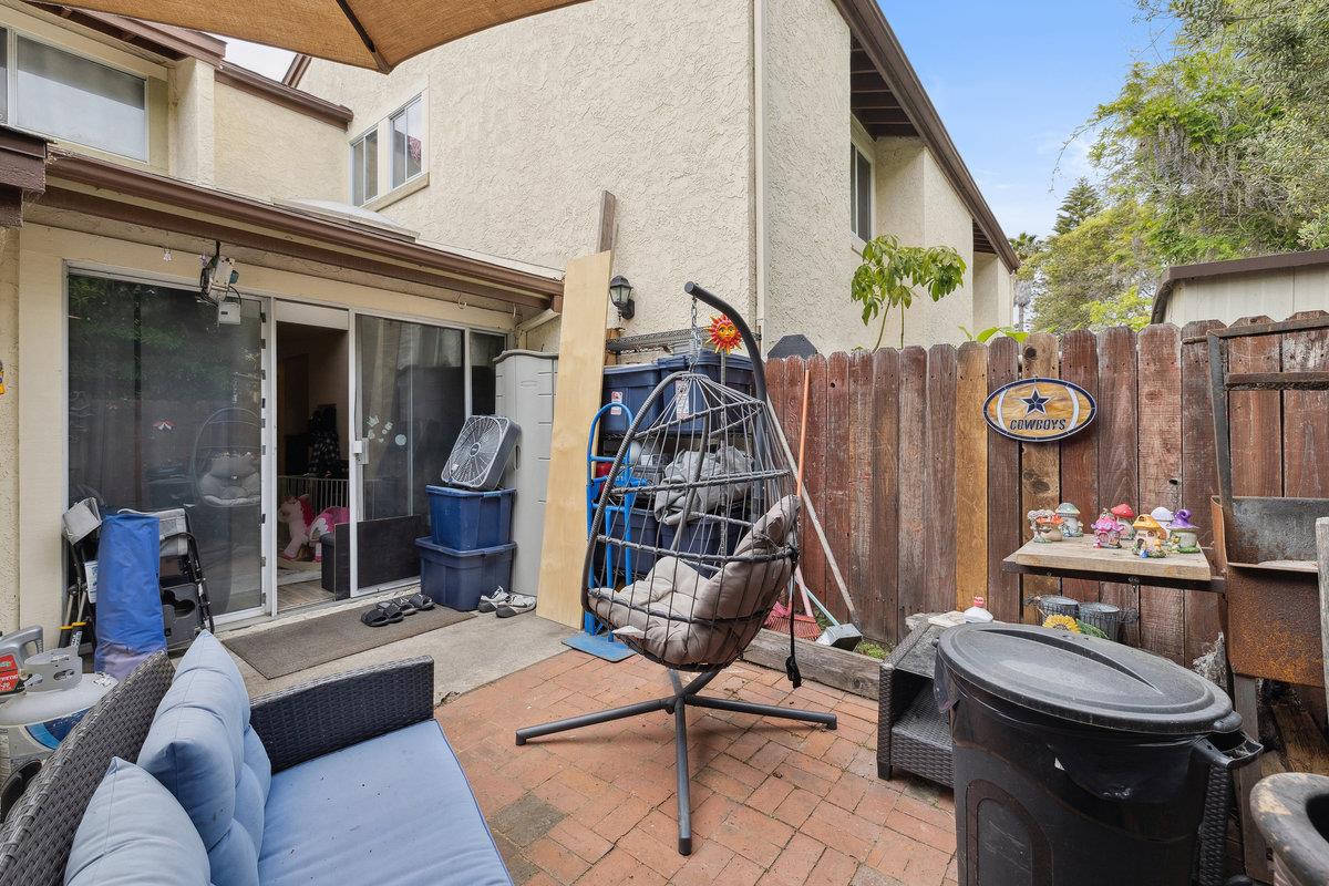 415 West Gutierrez Street, Unit 11 Santa Barbara, CA 93101 - Photo 14 of 16 a living room filled with furniture