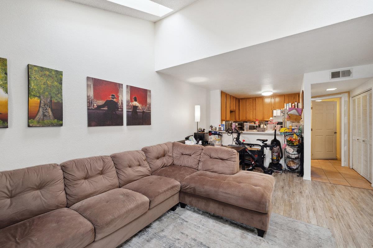 415 West Gutierrez Street, Unit 11 Santa Barbara, CA 93101 - Photo 5 of 16 a living room with furniture kitchen area and a couch