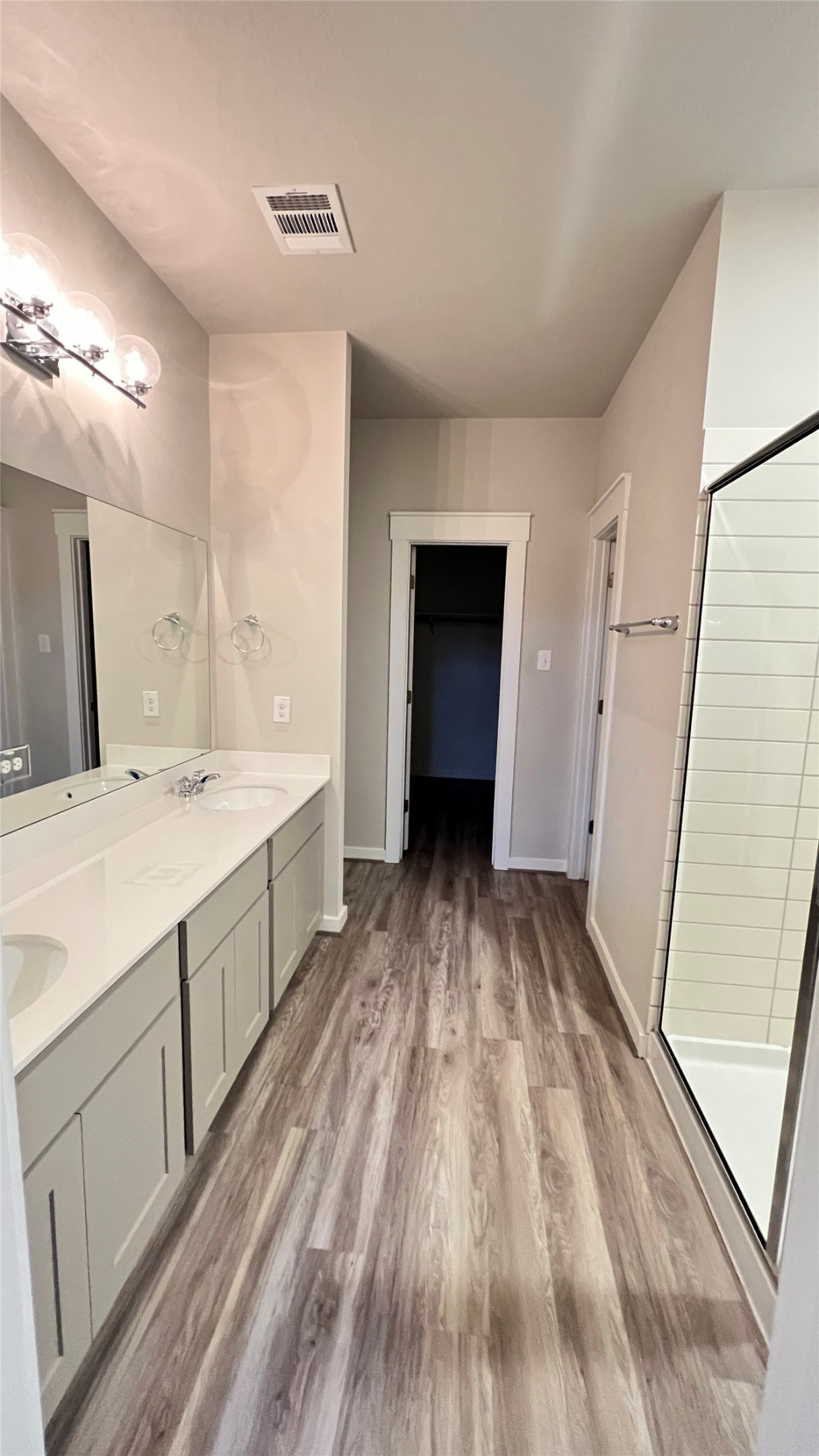 600 D Knopper Street Pflugerville, TX 78660 - Photo 11 of 24 a view of a bathroom with sink and mirror
