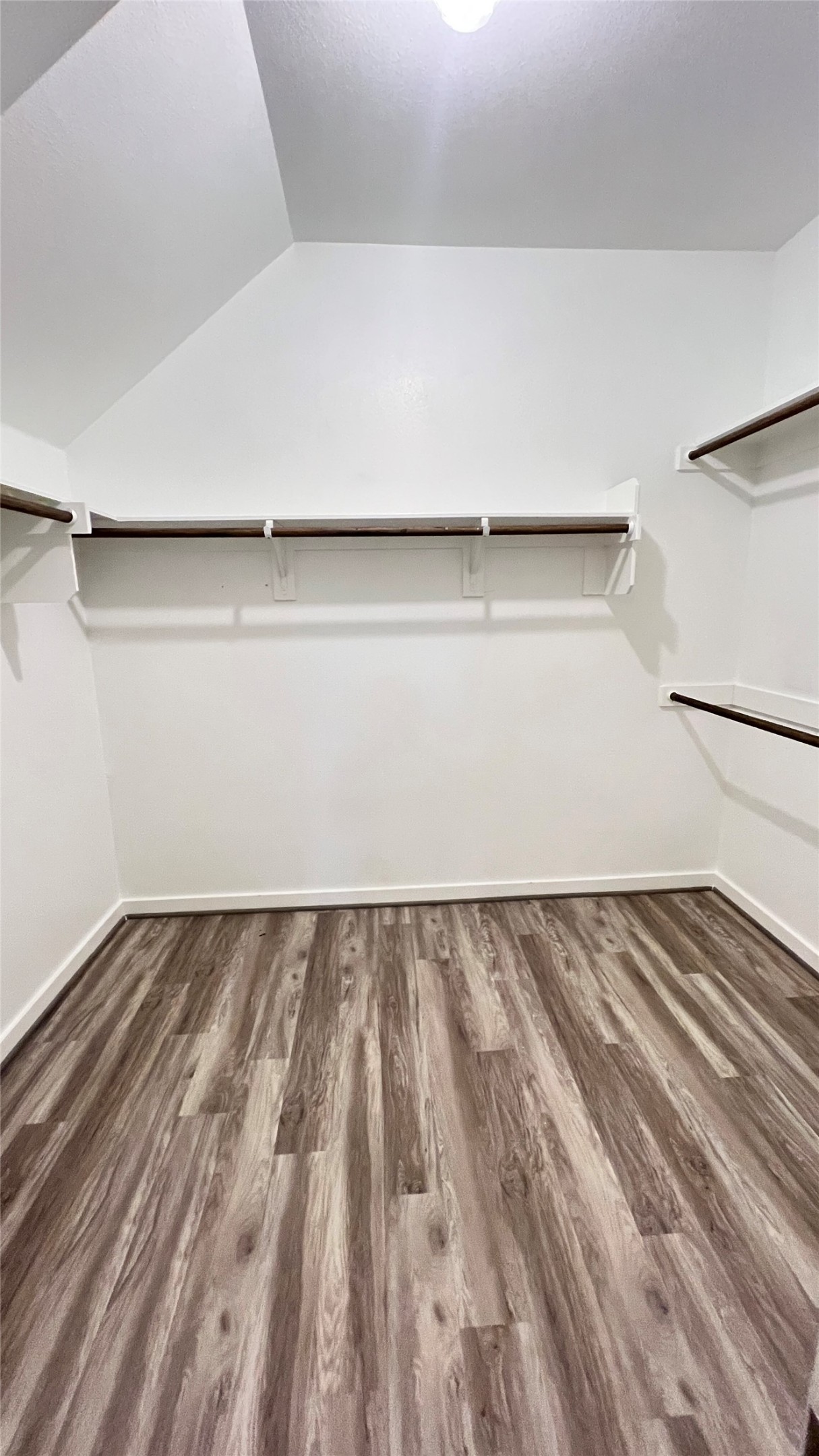 600 D Knopper Street Pflugerville, TX 78660 - Photo 16 of 24 a view of a room with wooden floor and bench