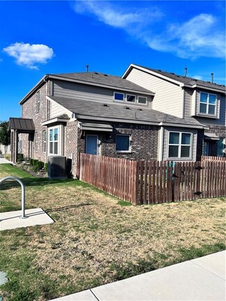 600 D Knopper Street Pflugerville, TX 78660 - Photo 22 of 24 a front view of a house with a yard