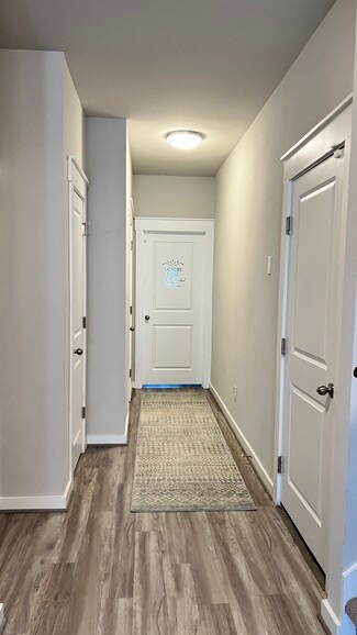 600 D Knopper Street Pflugerville, TX 78660 - Photo 23 of 24 wooden floor in an empty room