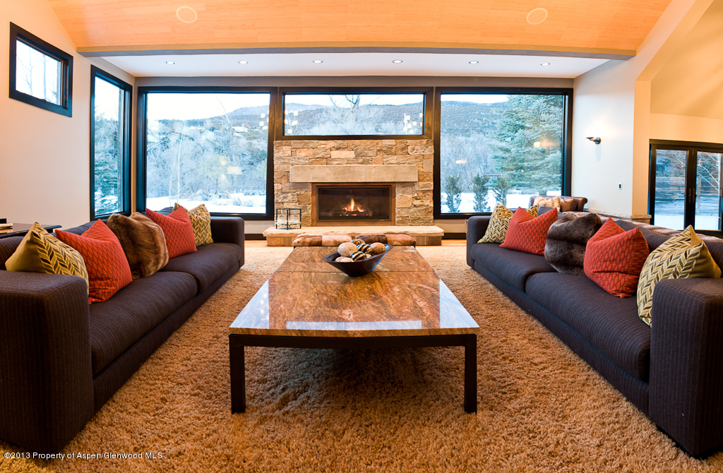 180 Riverside Drive Basalt, CO 81621 - Photo 4 of 14 a living room with a couch and a large window