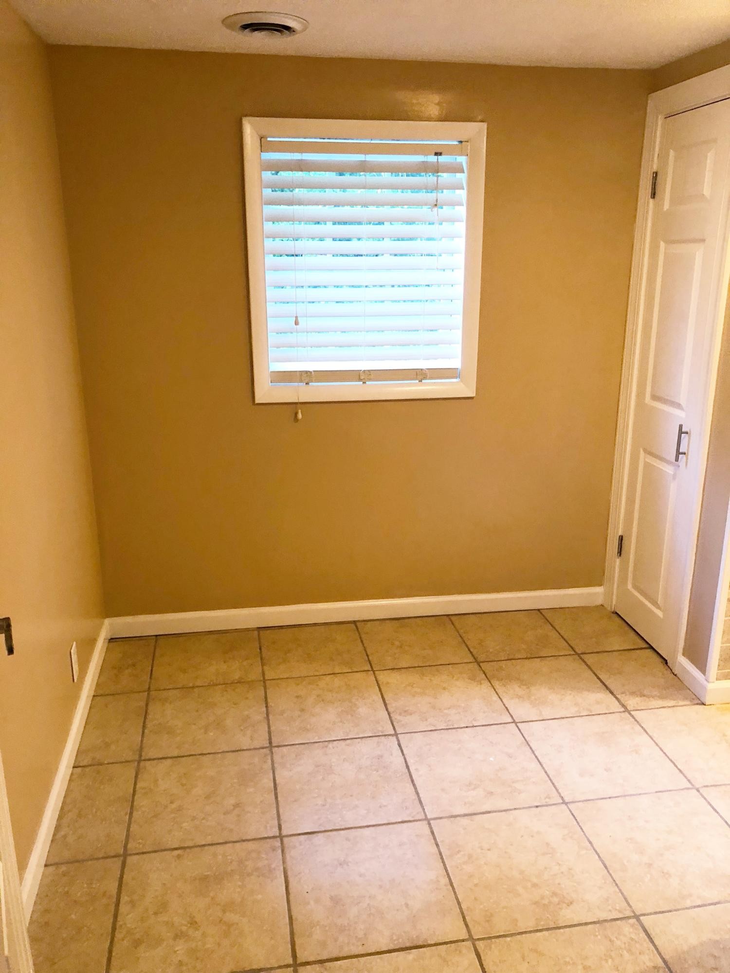 304 Lee Road Clinton, TN 37716 - Photo 9 of 21 a view of an empty room and window