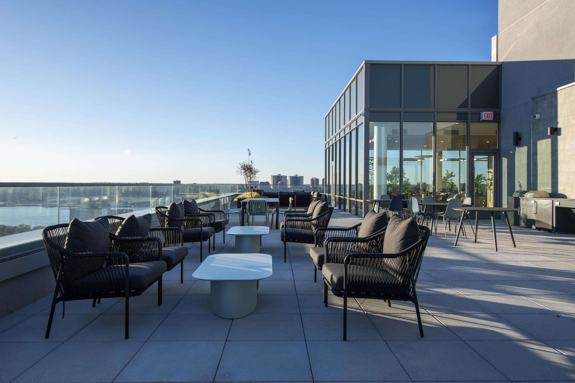 1440 Amsterdam Avenue, Unit 2218 Manhattan, NY 10027 - Photo 11 of 20 a view of a terrace with furniture and outdoor view