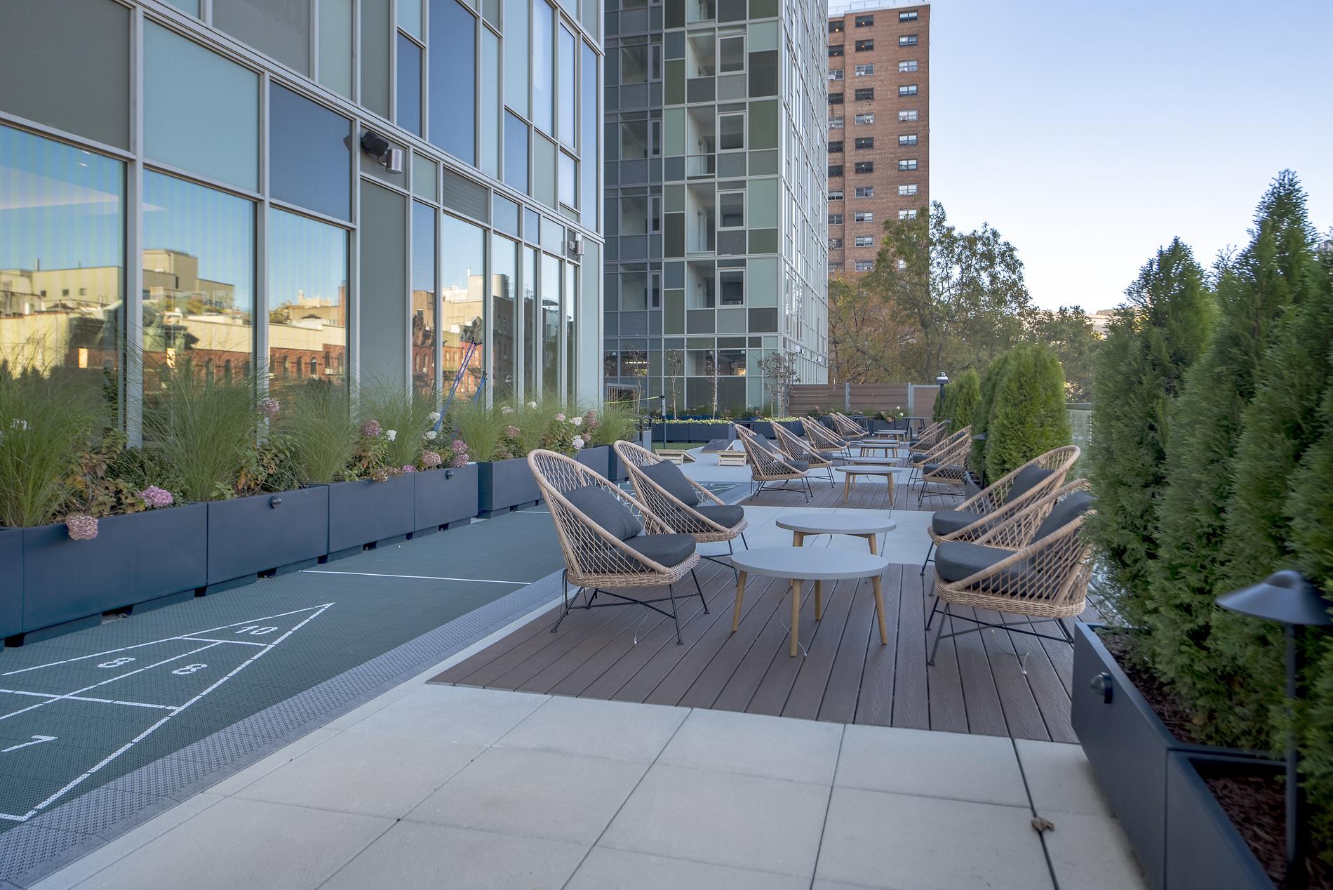1440 Amsterdam Avenue, Unit 2218 Manhattan, NY 10027 - Photo 13 of 20 a view of a patio with a table chairs and backyard