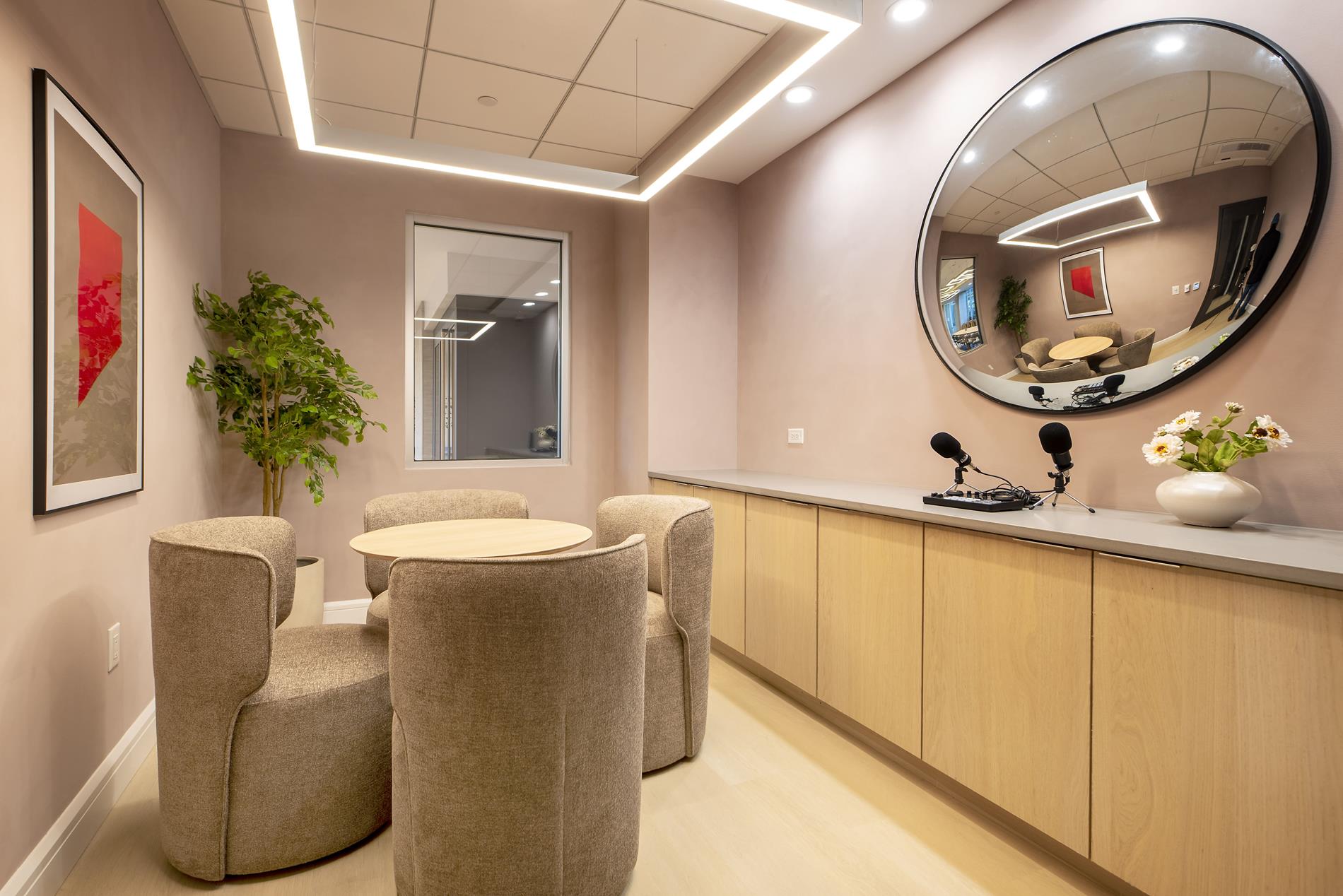 1440 Amsterdam Avenue, Unit 2218 Manhattan, NY 10027 - Photo 19 of 20 a living room with a couch and a potted plant