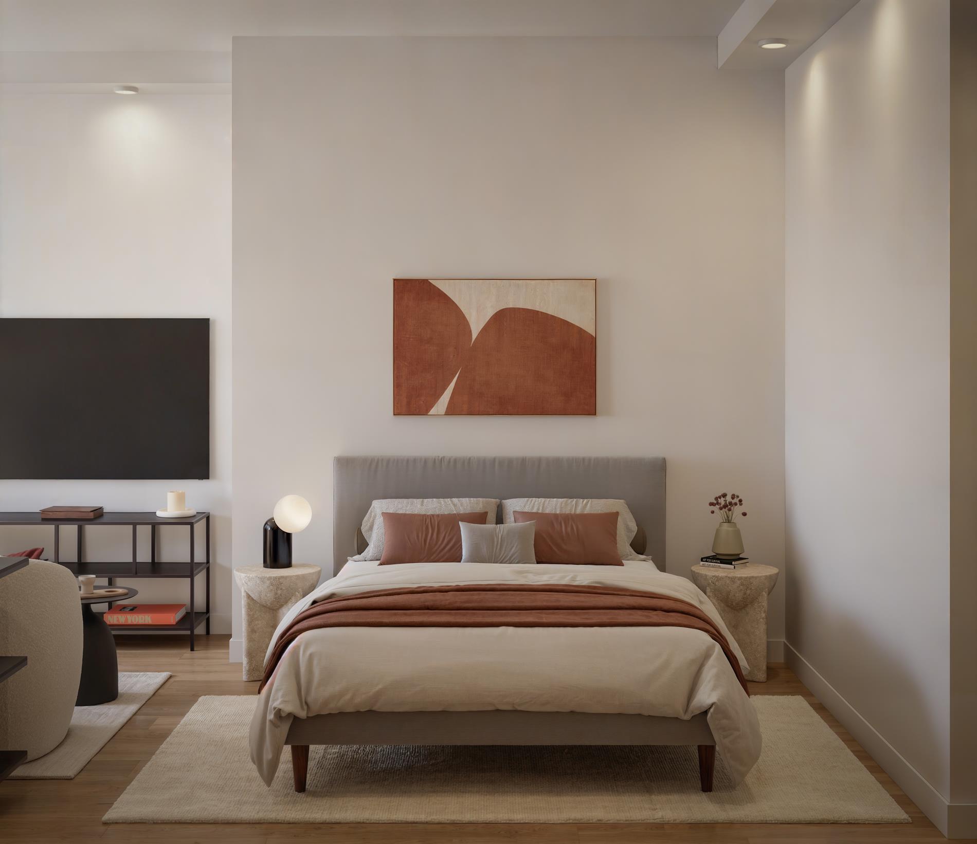 1440 Amsterdam Avenue, Unit 2218 Manhattan, NY 10027 - Photo 4 of 20 a bedroom with a bed and a flat screen tv