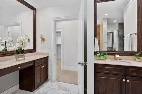 a bathroom with a bathtub and shower