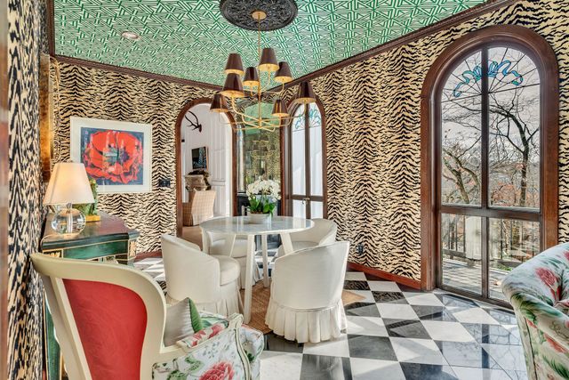 a outdoor living space with furniture and a fireplace