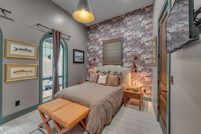 a view of a pathway with a wooden fence