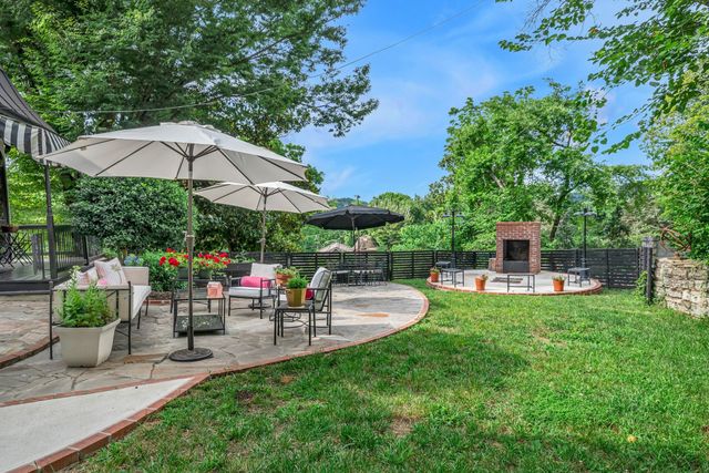 a view of a house with a street