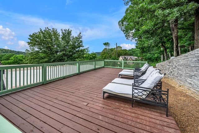 a kitchen with a sink cabinets and appliances