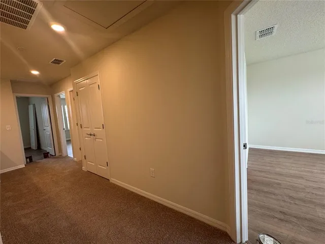 a bathroom with a double vanity sink a mirror and a shower