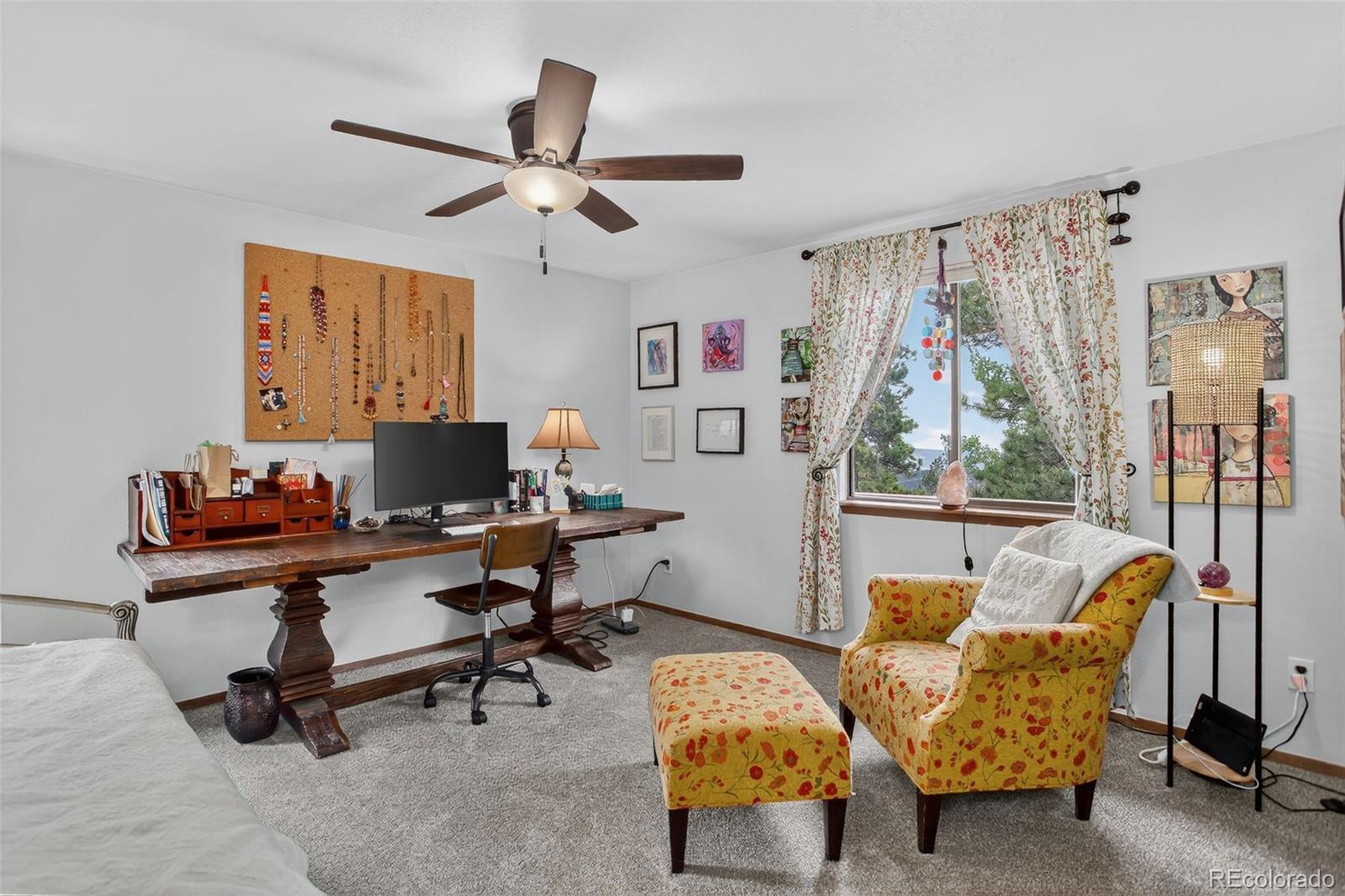 31911 Warrens Road Golden, CO 80403 - Photo 18 of 42 a workspace with furniture and window