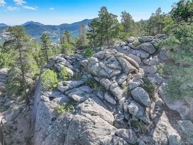 a view of a city with mountain