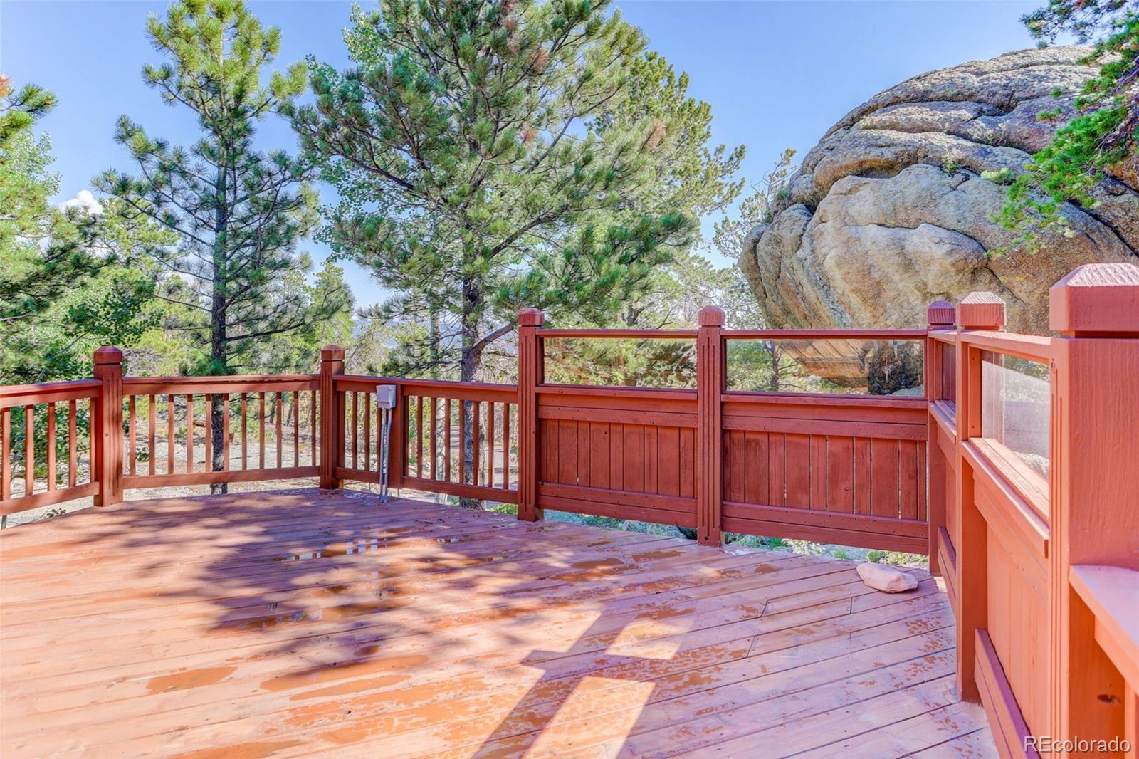 31911 Warrens Road Golden, CO 80403 - Photo 6 of 42 a view of a backyard