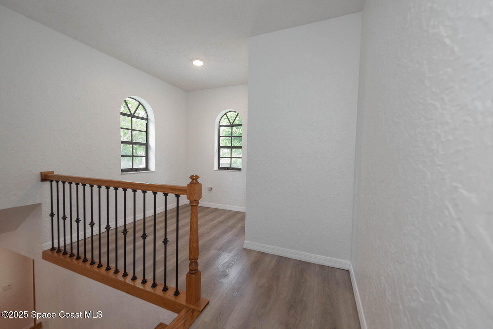 6 Point View Place Cocoa, FL 32926 - Photo 12 of 27 a view of entryway with wooden floor