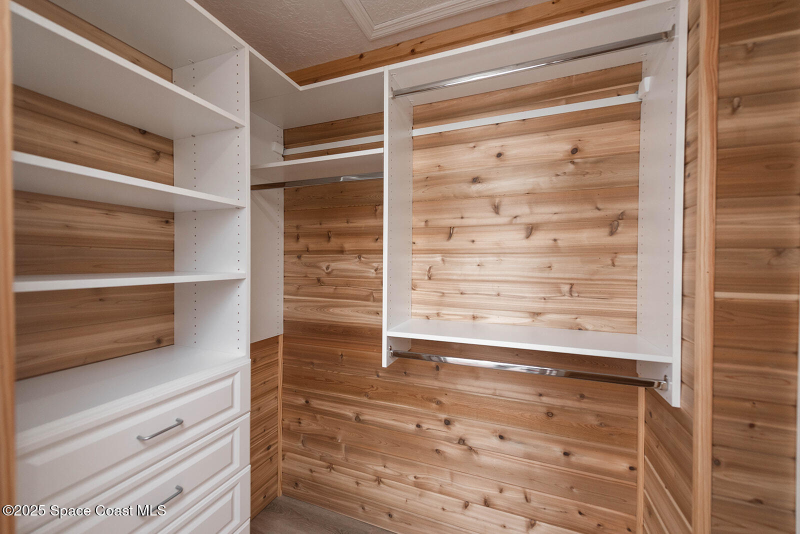 6 Point View Place Cocoa, FL 32926 - Photo 15 of 27 a view of walk in closet and empty room