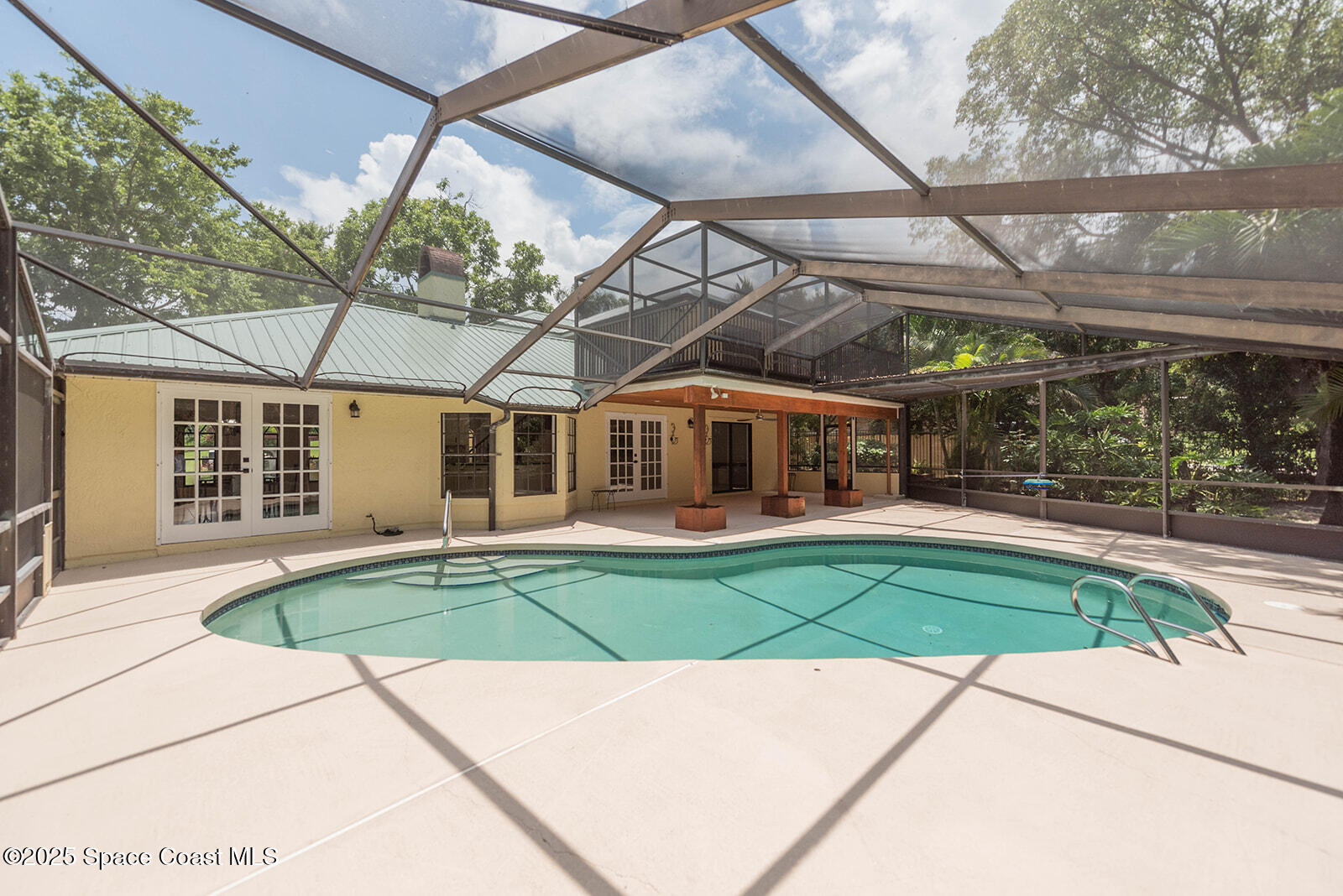 6 Point View Place Cocoa, FL 32926 - Photo 21 of 27 a house view with a sitting space