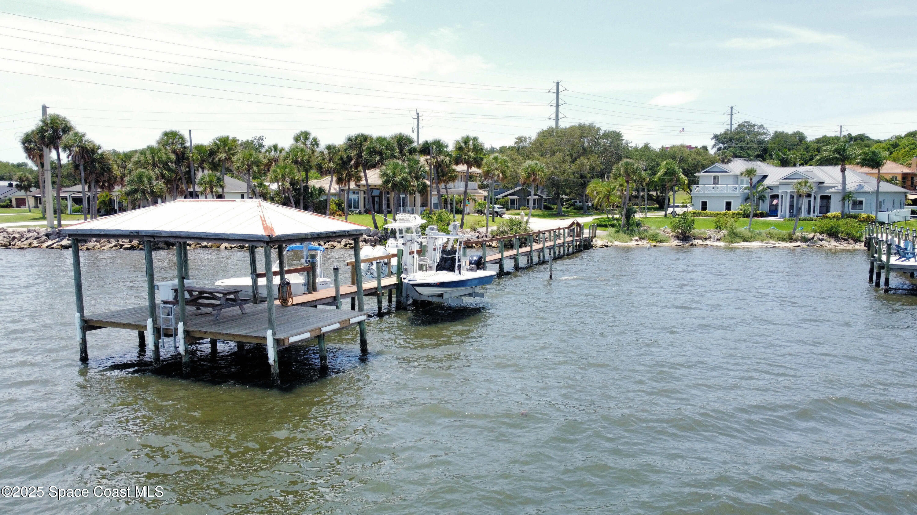 6 Point View Place Cocoa, FL 32926 - Photo 26 of 27 an outdoor space with seating