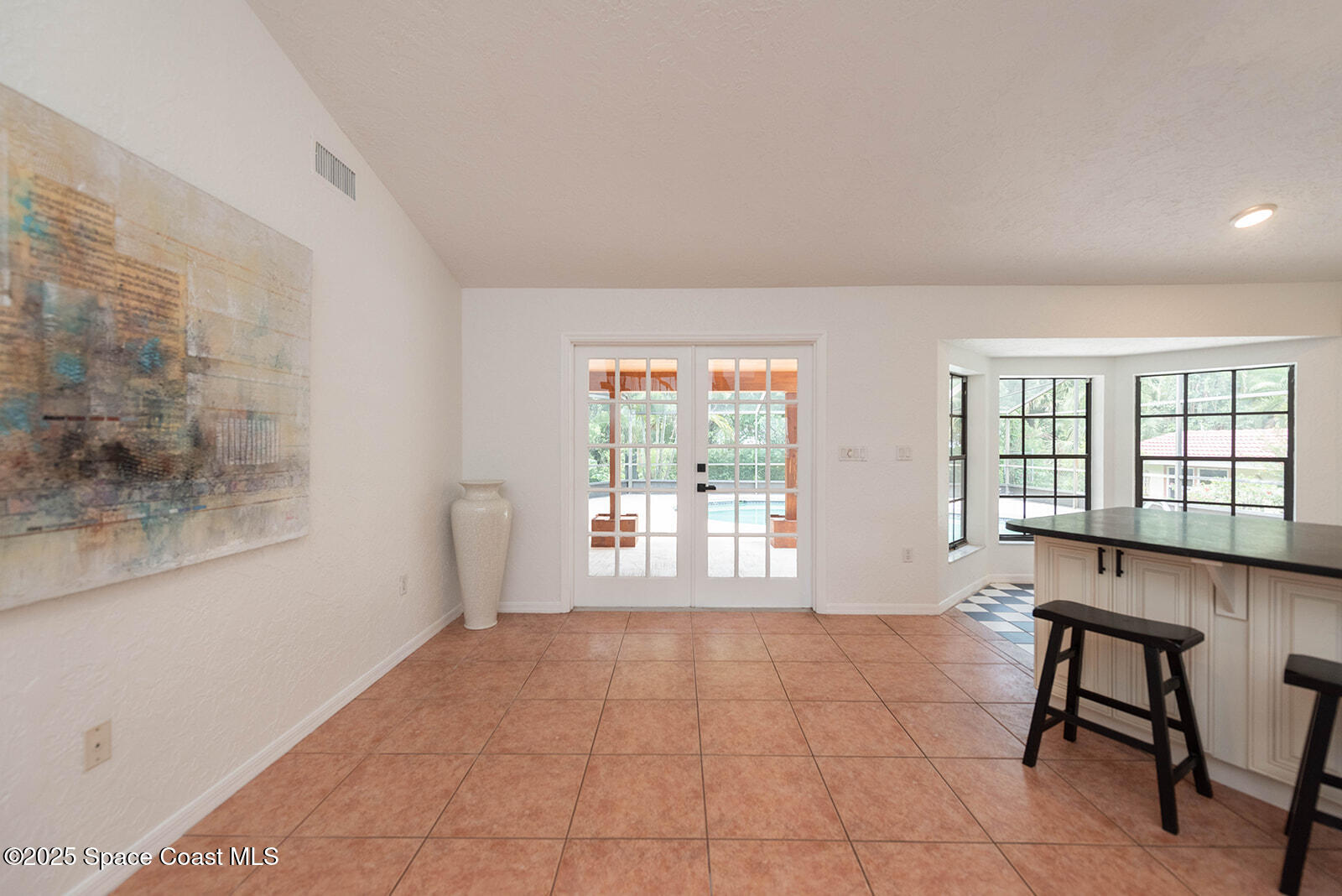 6 Point View Place Cocoa, FL 32926 - Photo 8 of 27 a view of an empty room with a window