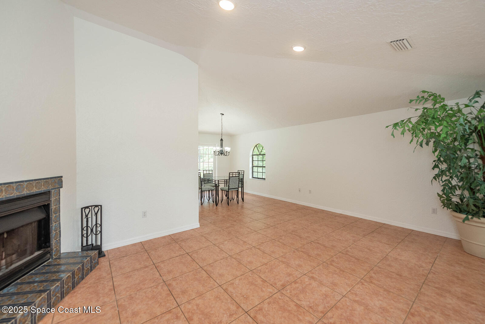 6 Point View Place Cocoa, FL 32926 - Photo 10 of 27 a view of kitchen with furniture and floor to ceiling window