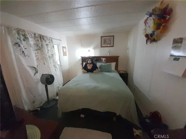 a kitchen with stainless steel appliances granite countertop a stove and a wooden floor