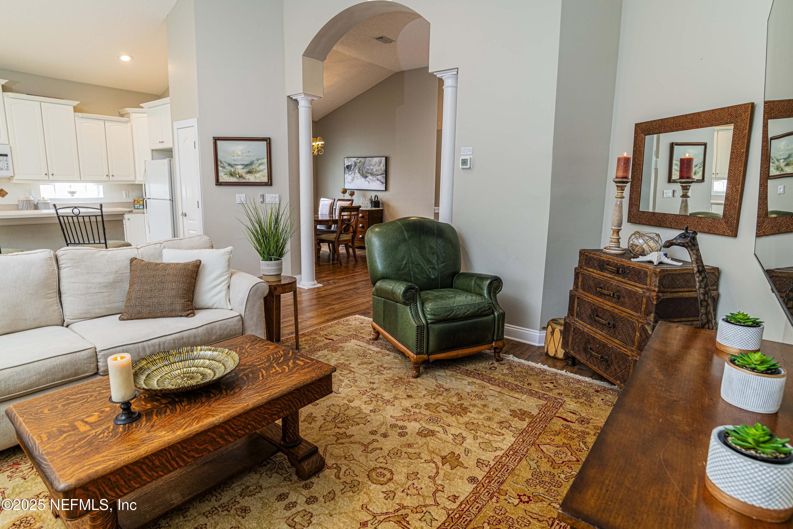 341 Island Green Drive St. Augustine, FL 32092 - Photo 11 of 49 a living room with furniture and wooden floor
