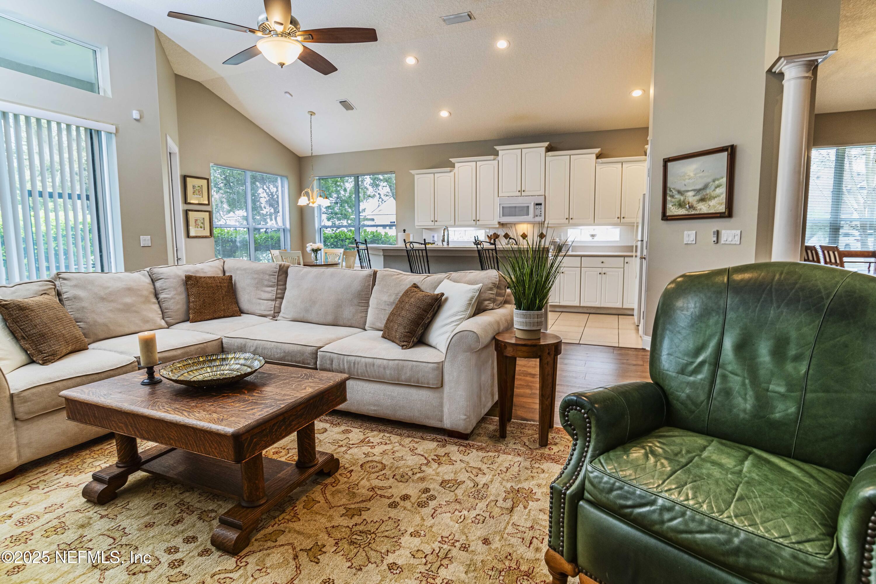 341 Island Green Drive St. Augustine, FL 32092 - Photo 15 of 49 a living room with furniture and a large window