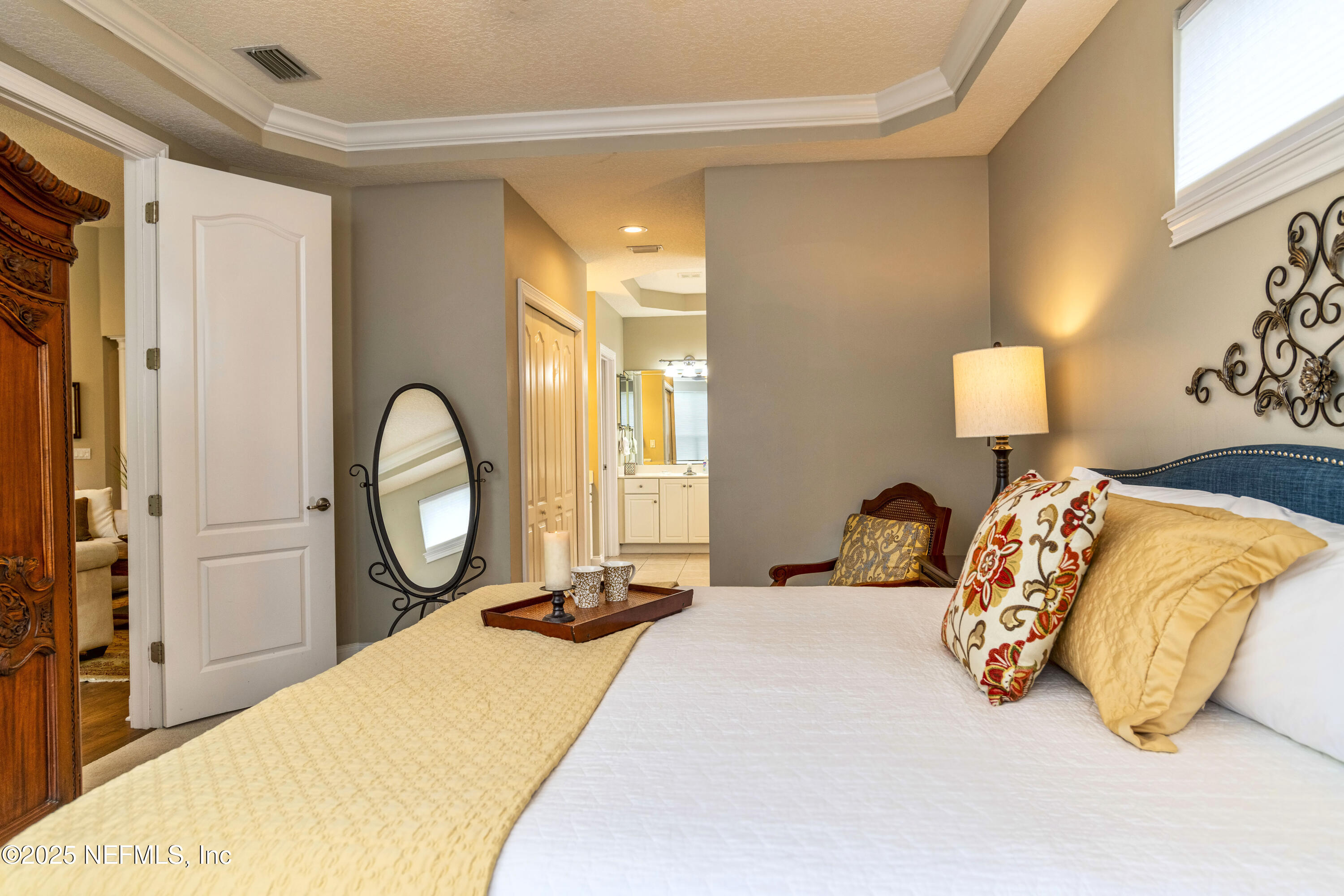 341 Island Green Drive St. Augustine, FL 32092 - Photo 22 of 49 a bedroom with a bed and window